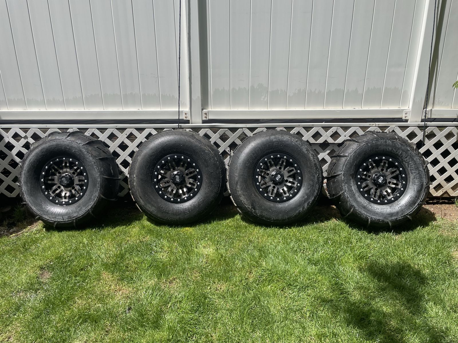 Like new RZR paddle/sand tire set
