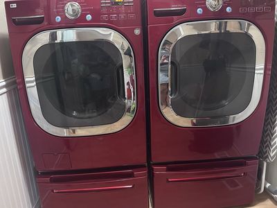 LG Front Load Washer and Dryer Set with Pedestals -