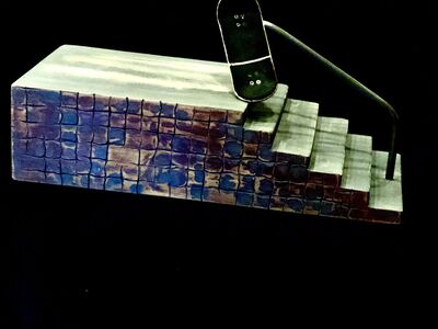 Fingerboard stair obstacle.