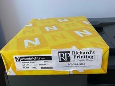 9 packages of Astrobright gamma green 8.5 x 11 24lb.