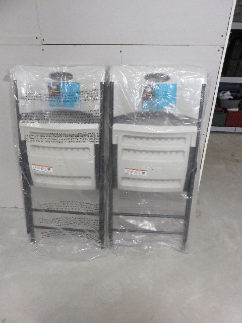 PAIR OF IDENTICAL NEW LIFETIME FOLDING CHAIRS - STILL IN THEIR CLEAR PLASTIC WRAPPING