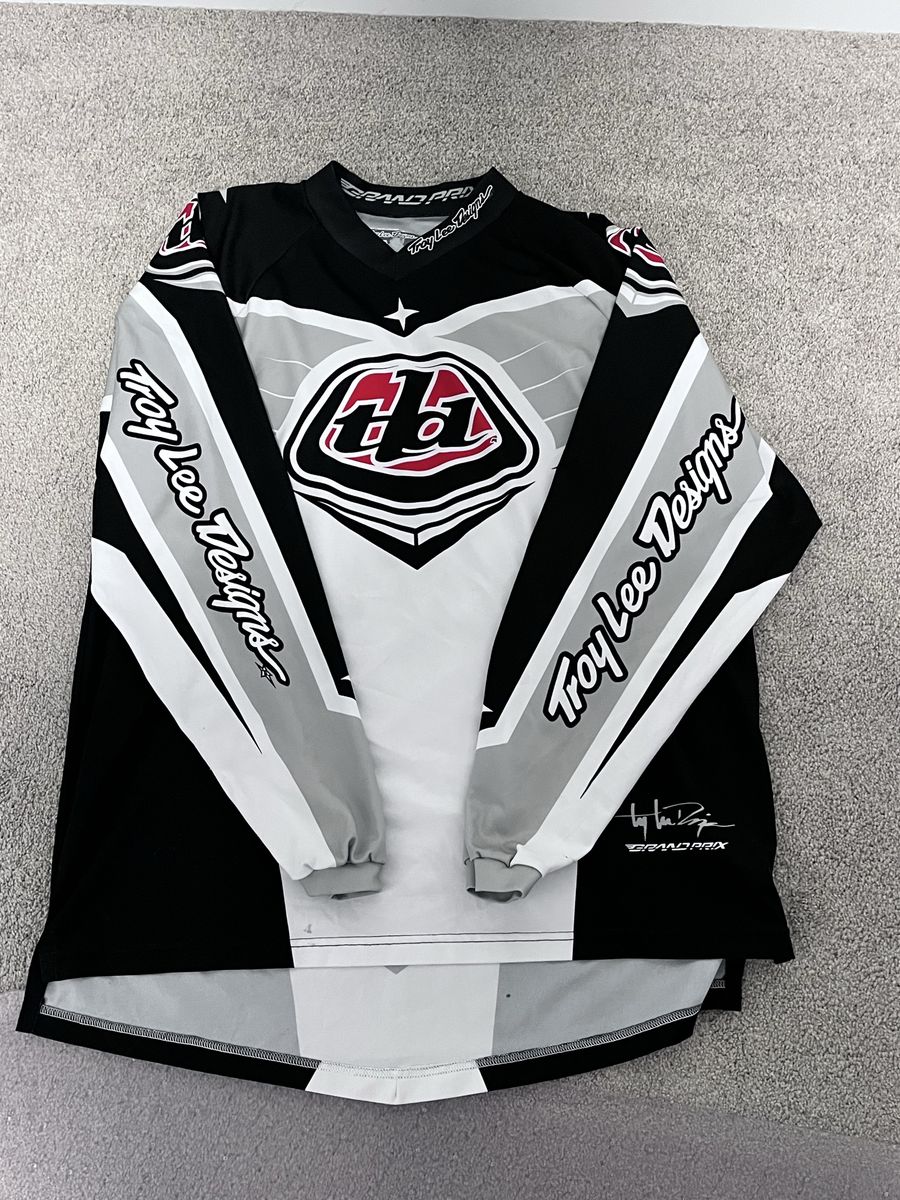 Two Motocross Jerseys – XL – Troy Lee Designs + Fly Racing