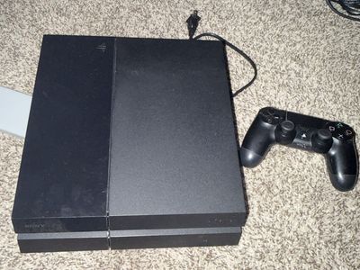 Sony PlayStation 4 Console with Controller