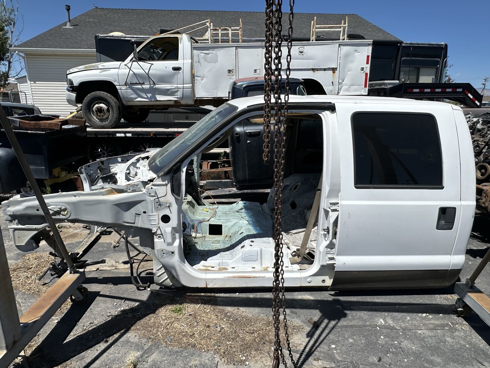 Ford Crew cab with rear doors and interior door panels.
