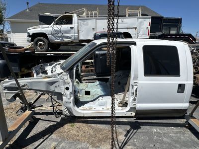 Ford Crew cab with rear doors and interior door panels.