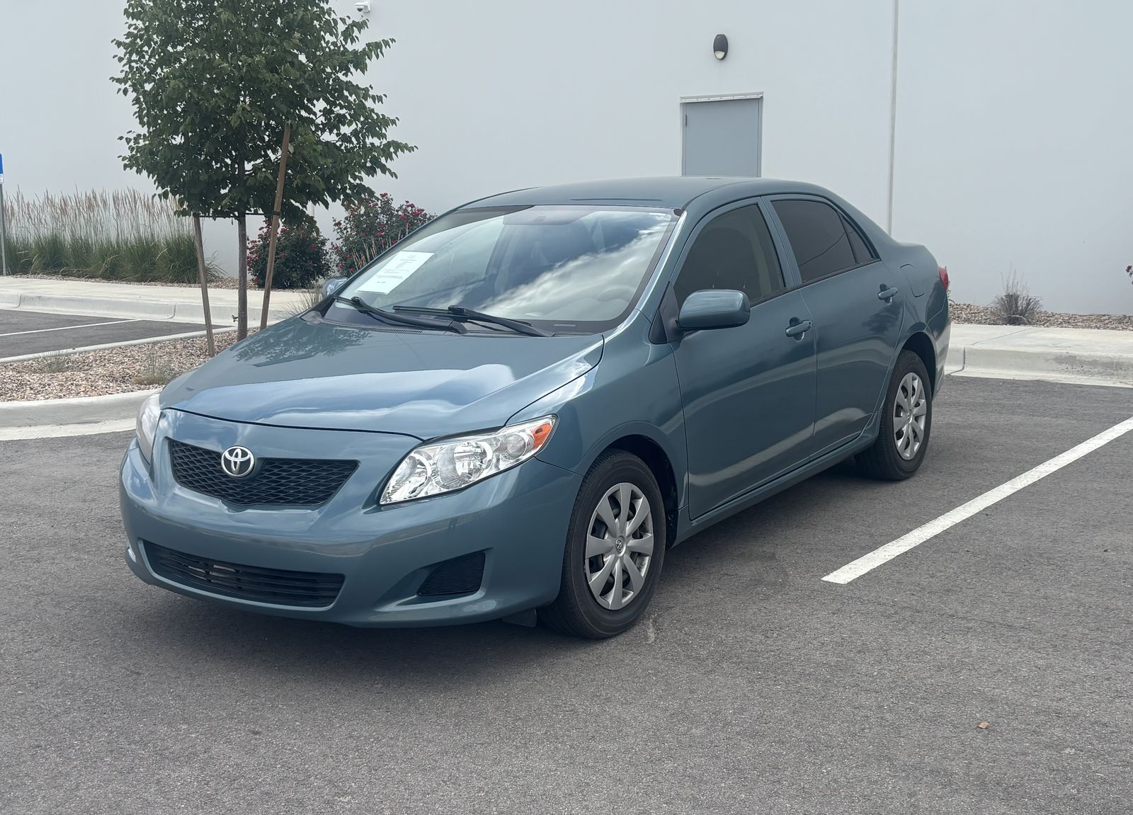 2010 Toyota Corolla LE — rebuilt & branded title