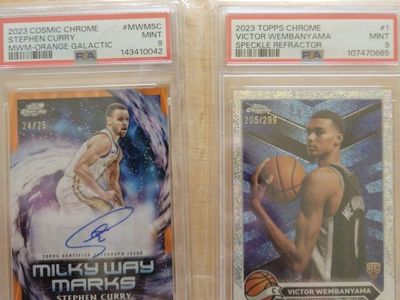 Topps chrome- Wemby , Steph Curry