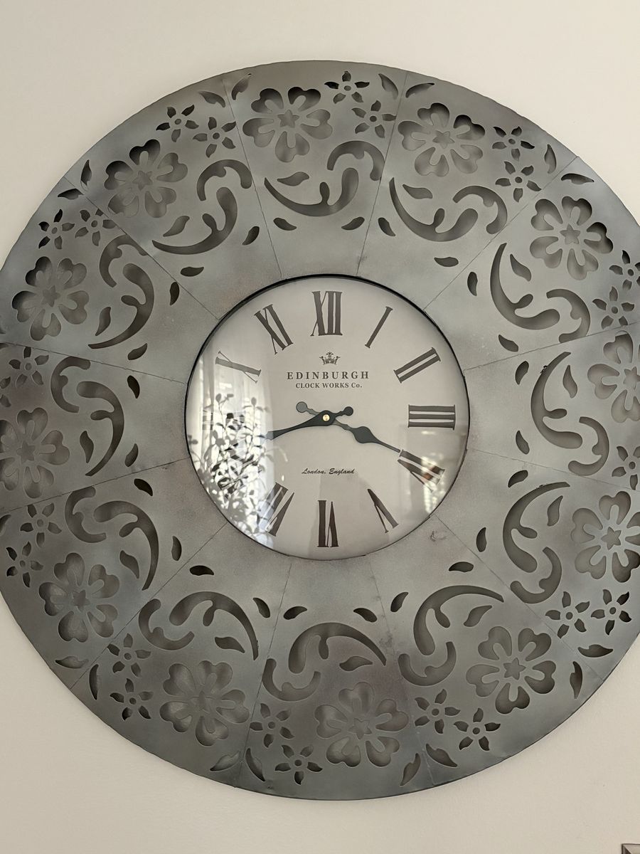 Oversized metal wall clock