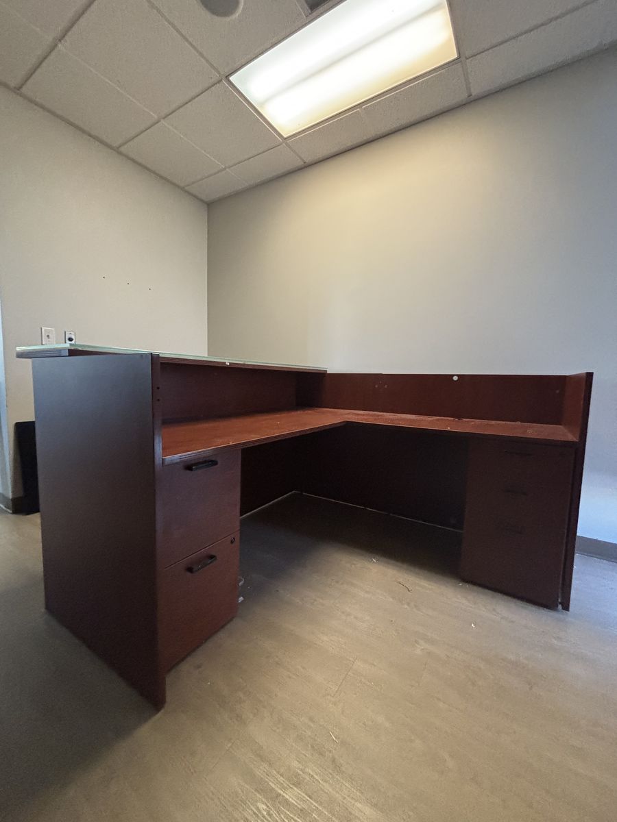 L-Shaped Reception Desk with raised transaction counter