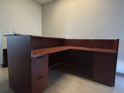 L-Shaped Reception Desk with raised transaction counter