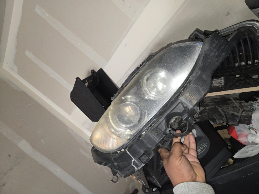 BMW Headlight Assembly - Passenger Side - Used