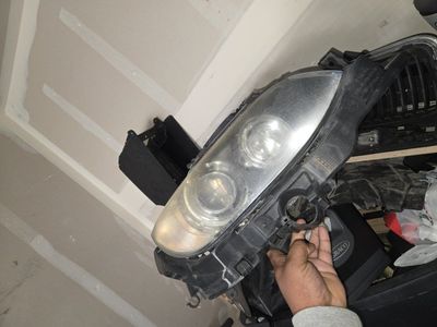 BMW Headlight Assembly - Passenger Side - Used