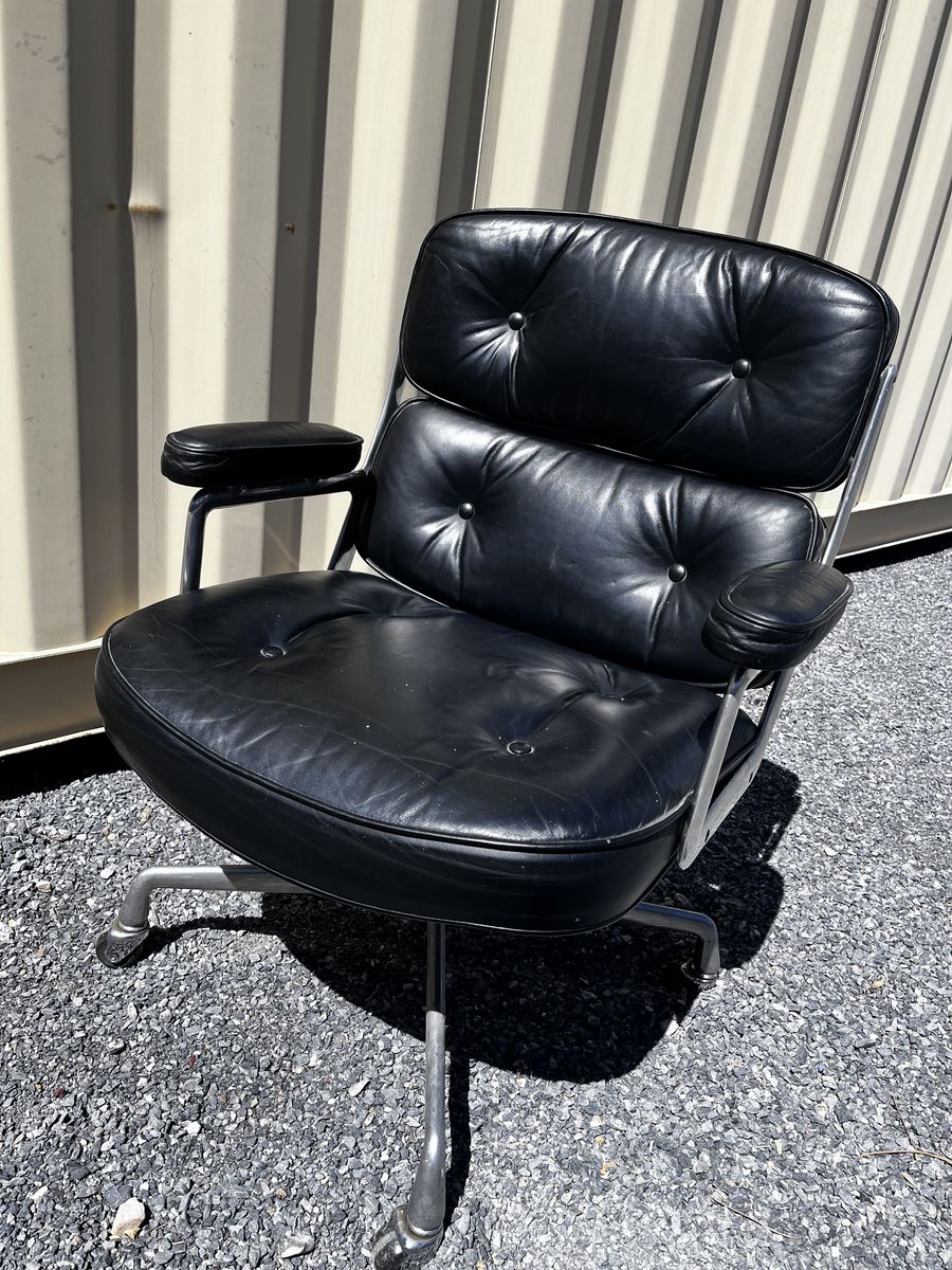 Herman miller eames black leather chairs.  3 available for $900 each