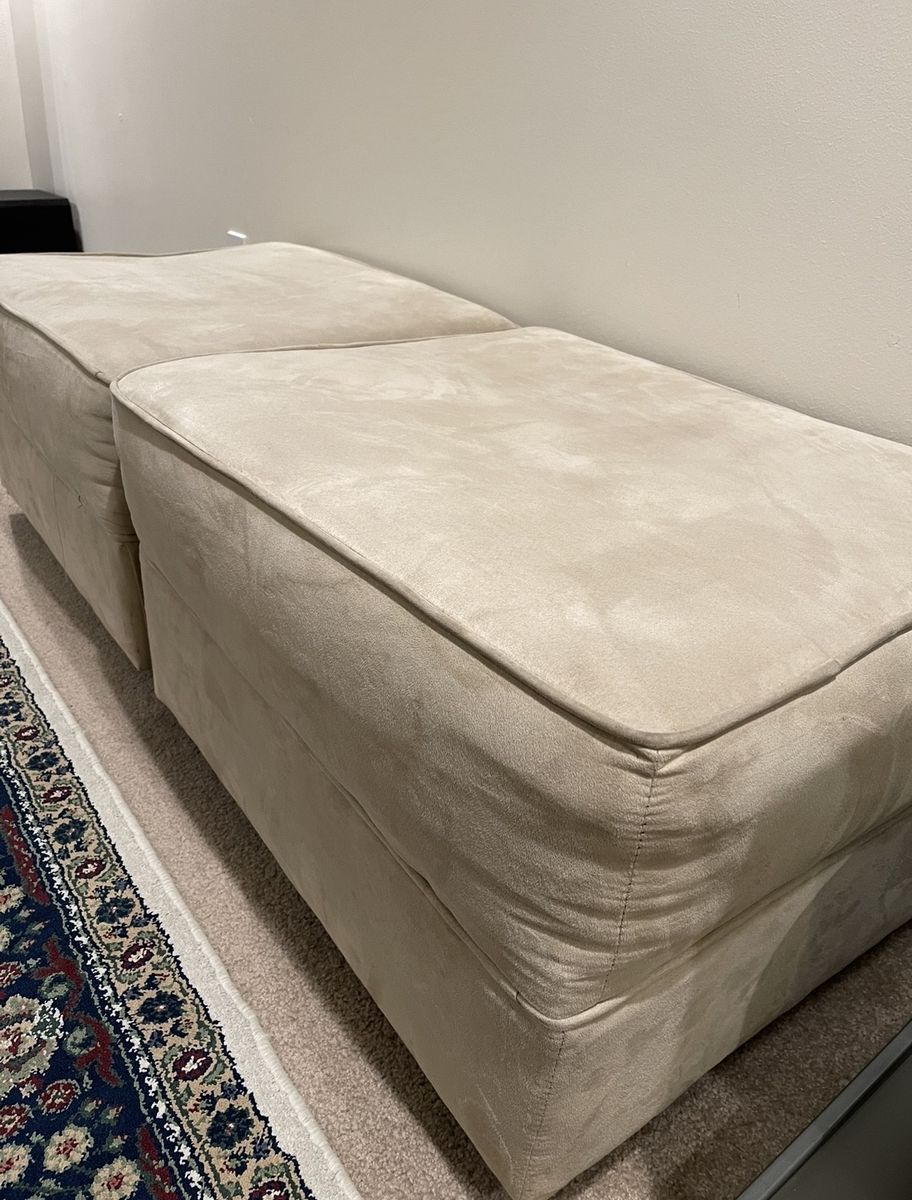 Comfy Beige / Cream Upholstered Ottomans with wheels