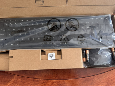 New in box, HP wireless keyboard and mouse - a complete set