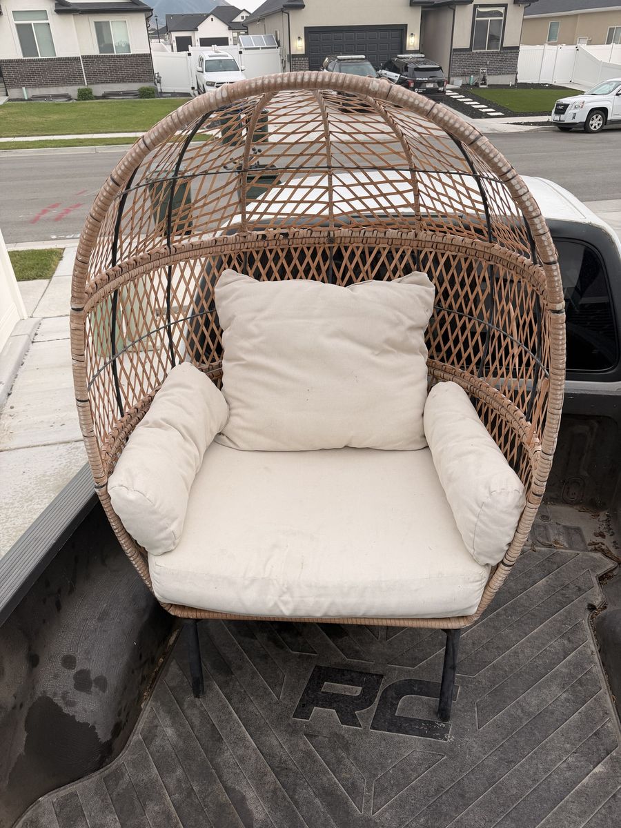 Egg chair and glass top side table