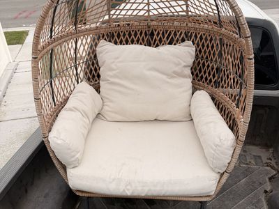 Egg chair and glass top side table