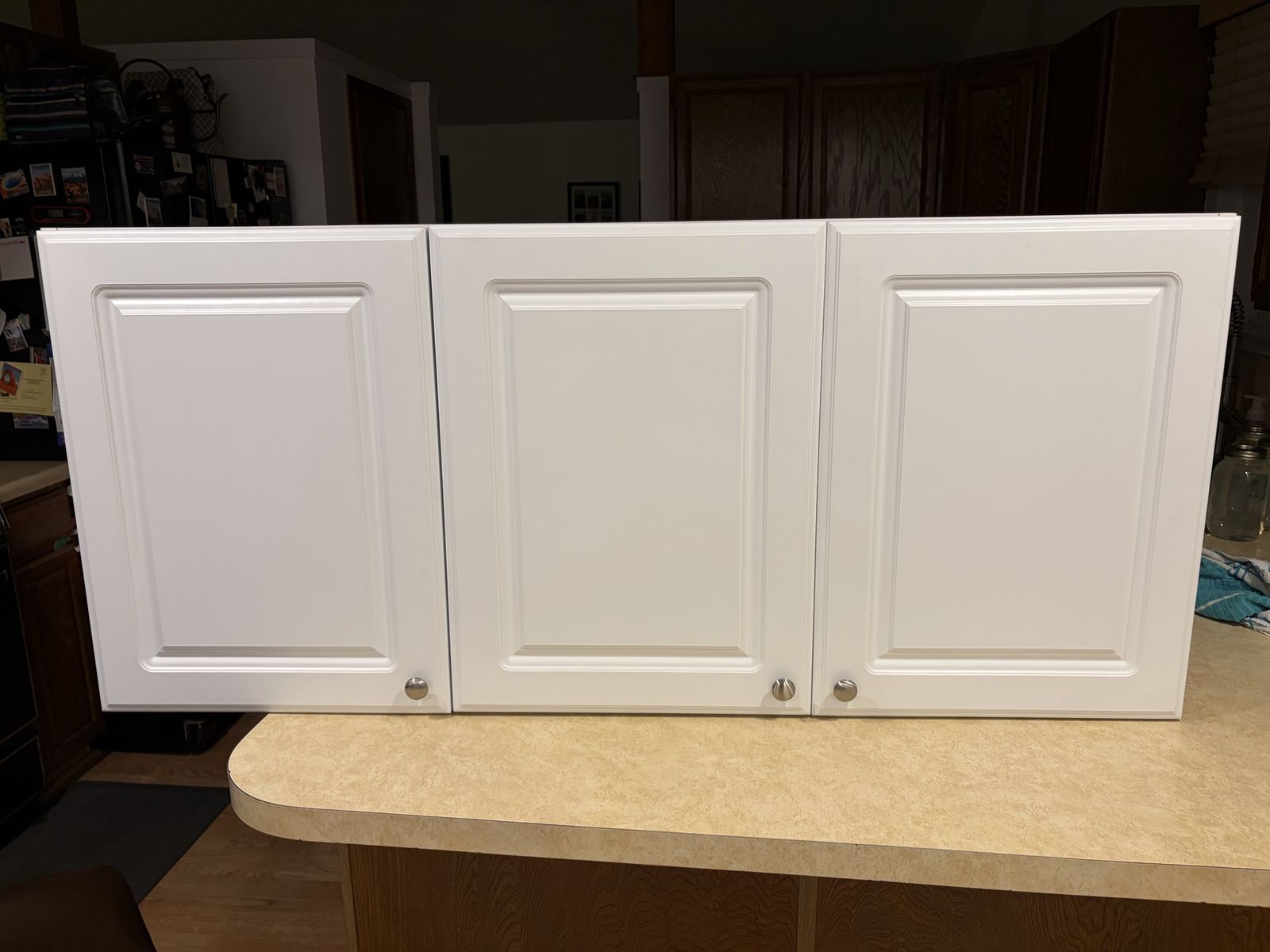 Gently used White Shaker Style Wall Cabinet - 3 Doors, 2 Shelves, Modern Kitchen Storage