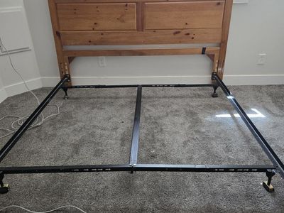 Wooden Headboard with Decorative Carving and Metal Bed Frame king size frame