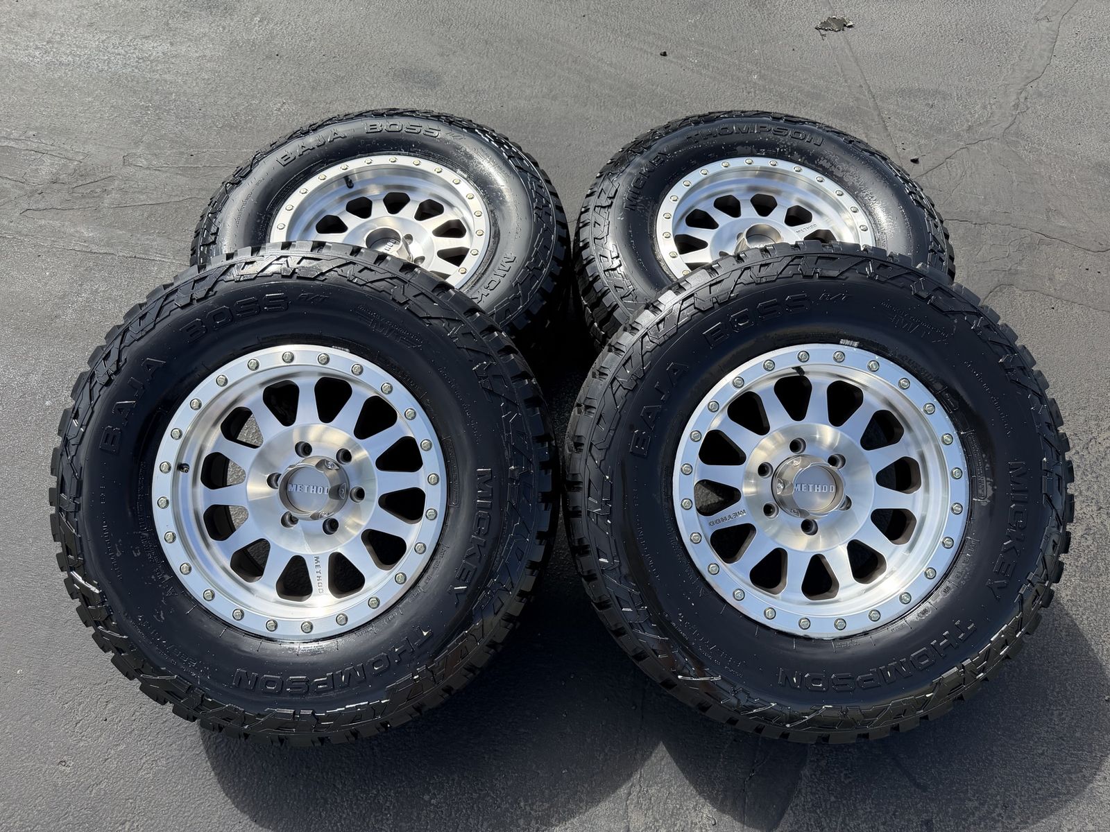 New Silver Method LT285/70r17 AT 6x5.5 Chevy GMC 6