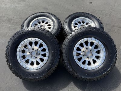 New Silver Method LT285/70r17 AT 6x5.5 Chevy GMC 6