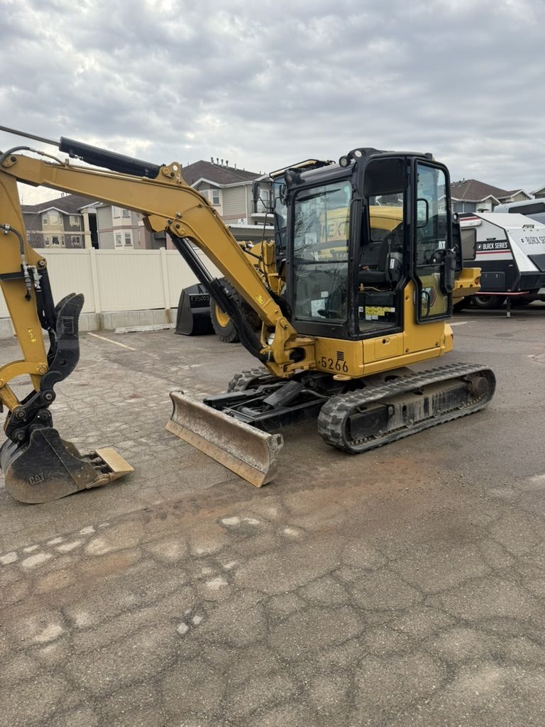 Mini Excavator Rental – Cat 303.5 - 35 Class Machine with Thumb and Blade