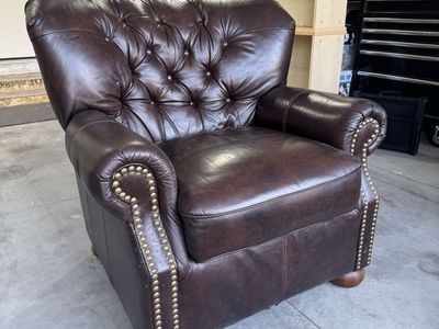 Dark brown leather lounge chair