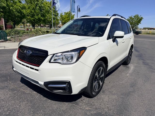 2017 Subaru Forester 2.5i Premium — rebuilt & branded title, 21% below market