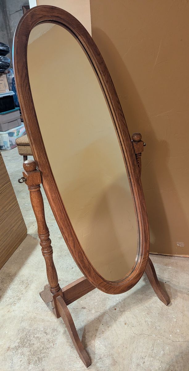 Crown Mark - Oval Freestanding Chevel Mirror - Oak Finish
