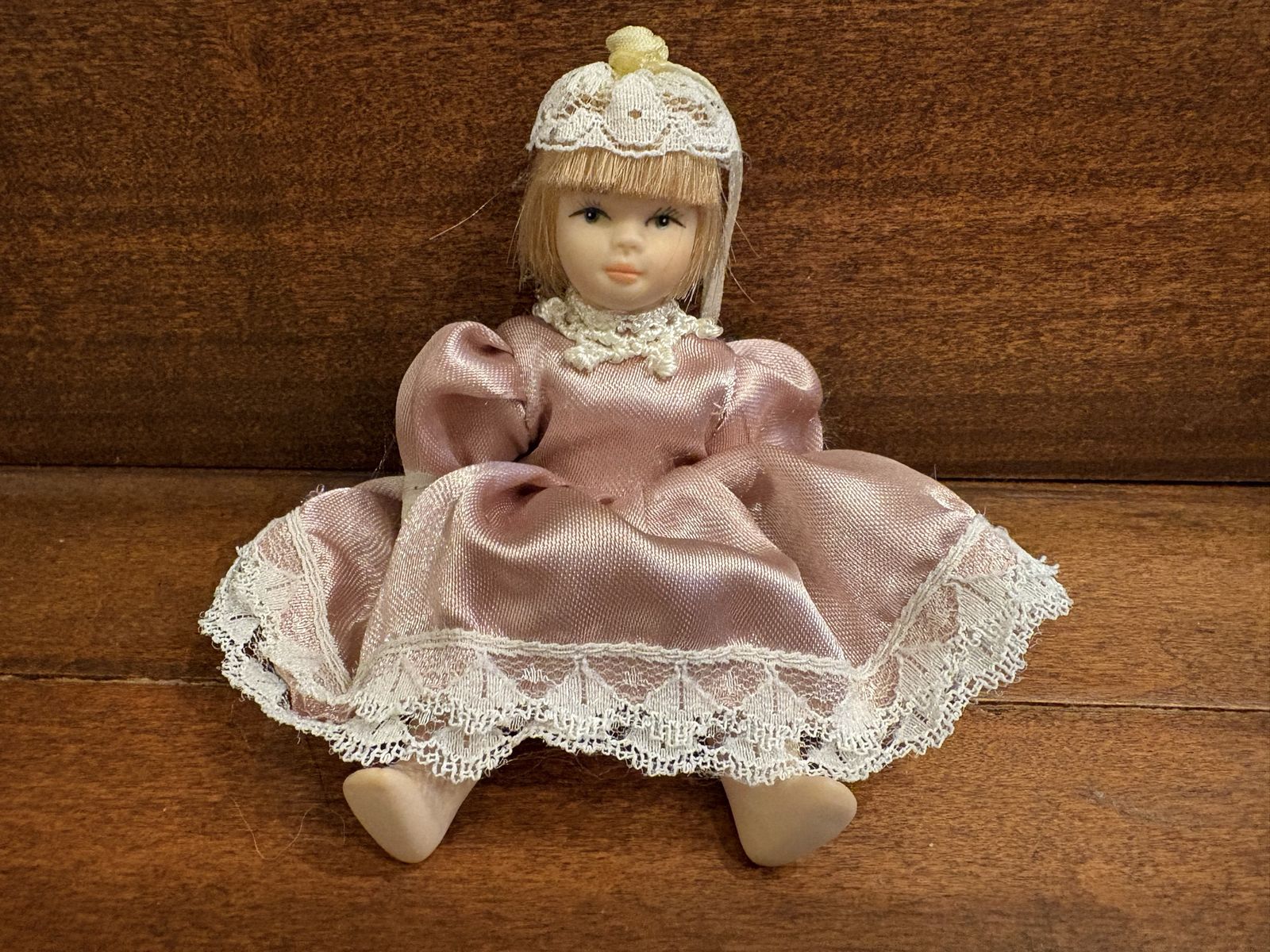 Miniature Porcelain Doll in Pink Satin