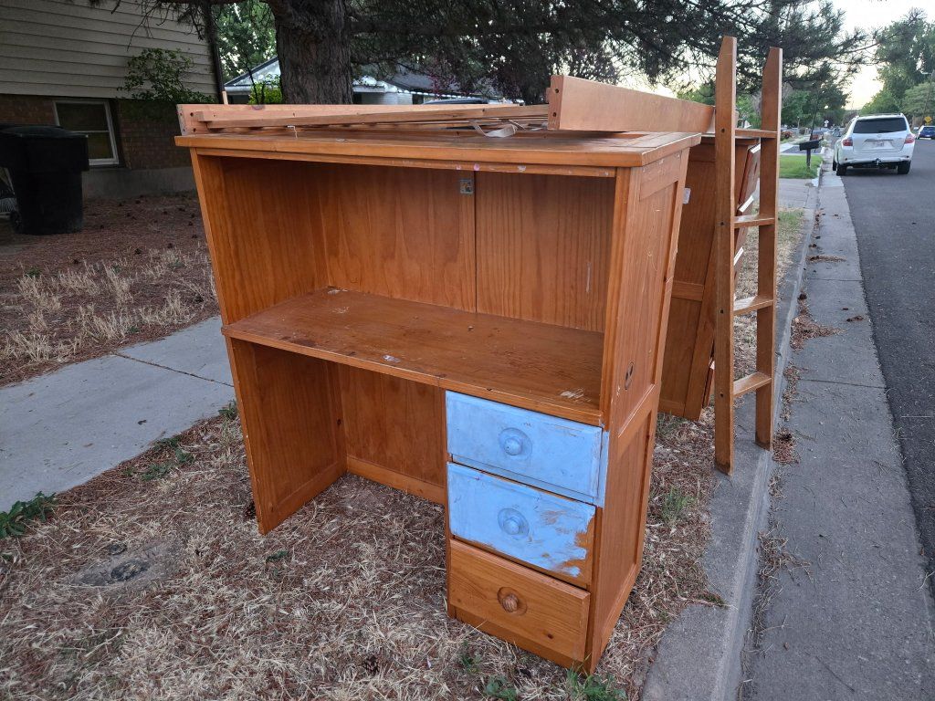curb alert.  Used Wooden Bunk Bed Frame with Integrated Desk, Shelves, and Drawers - Spider-Man Decals