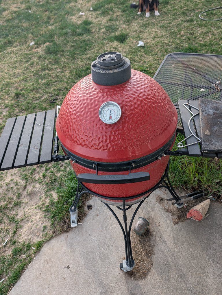 used komado joe 2 grill/smoker, red in color