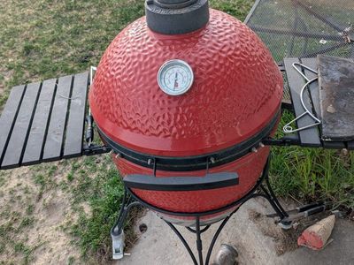 used komado joe 2 grill/smoker, red in color