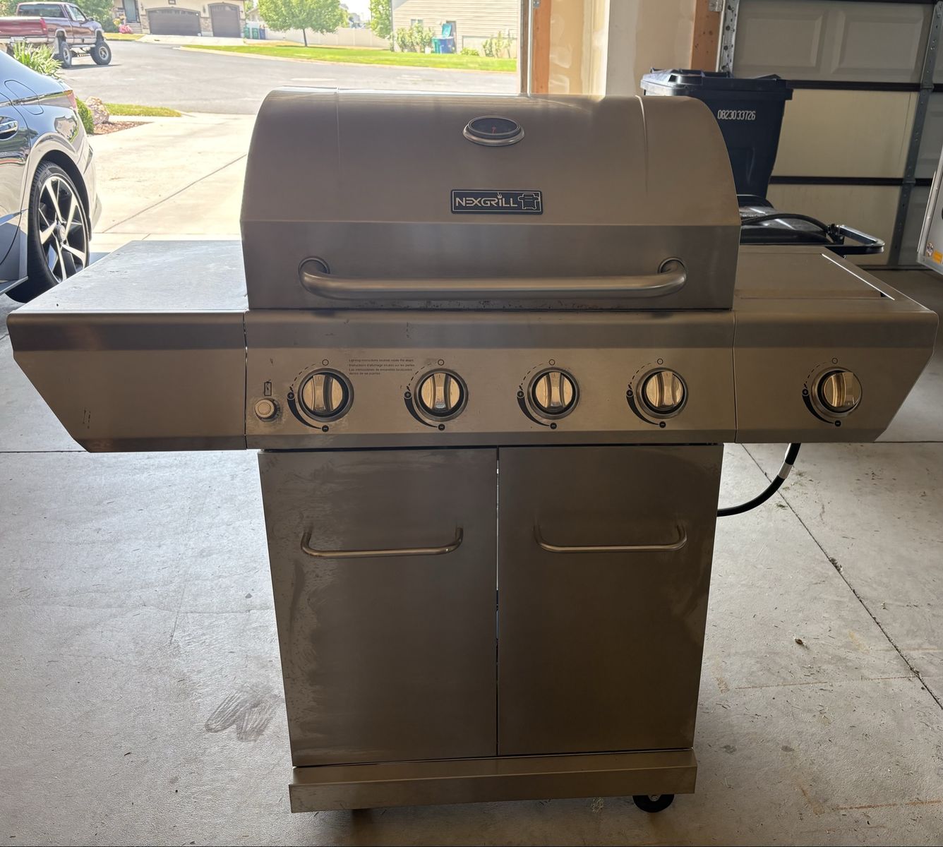 Nexgrill Stainless steel 4 burner propane grill + side burner 720-083H
