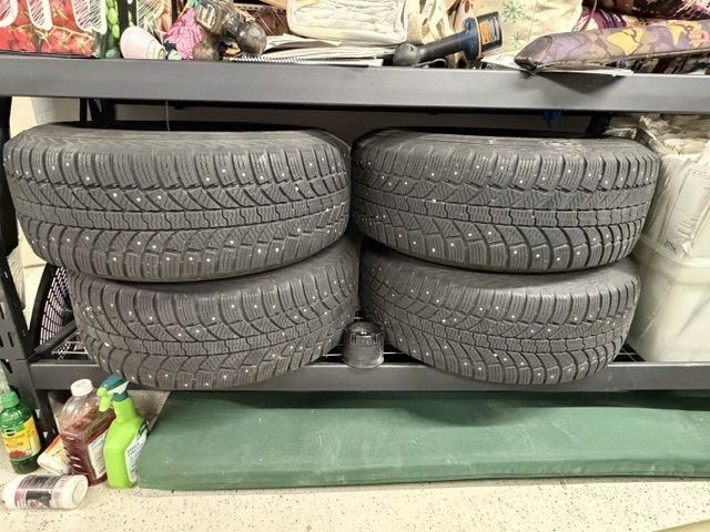 Method MR301 Black Wheels w/ General Grabber Arctic XL Studded Winter Tires 265/70R16