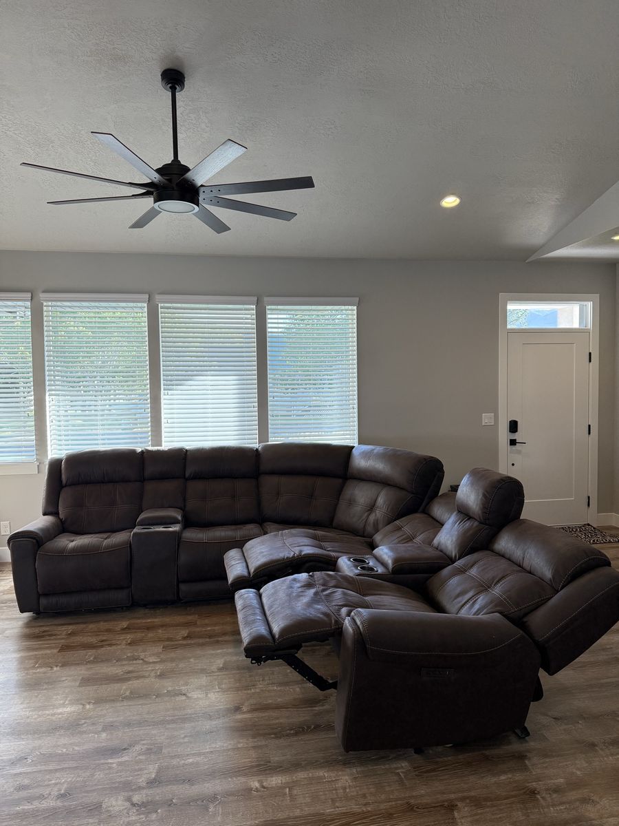 Comfortable Dark Brown Sectional Sofa with Recliners and Cupholders - Great for Living Room