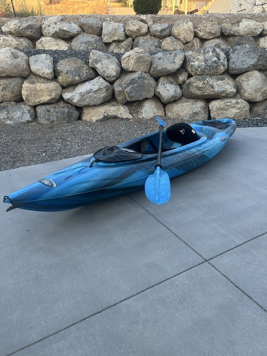 Pelican Blue 10 ft Sit-in Kayak with Paddle - Used, Great Condition