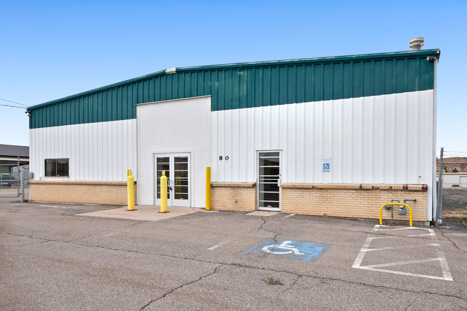 7,200 SF Industrial Building with Gated Yard Space For Lease