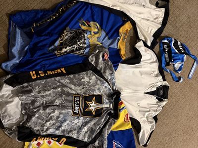 Lot of 5 and more Cycling Jerseys: US Army, Corona, SRAM & More - Assorted Sizes & Styles ranging from Medium to mostly large.