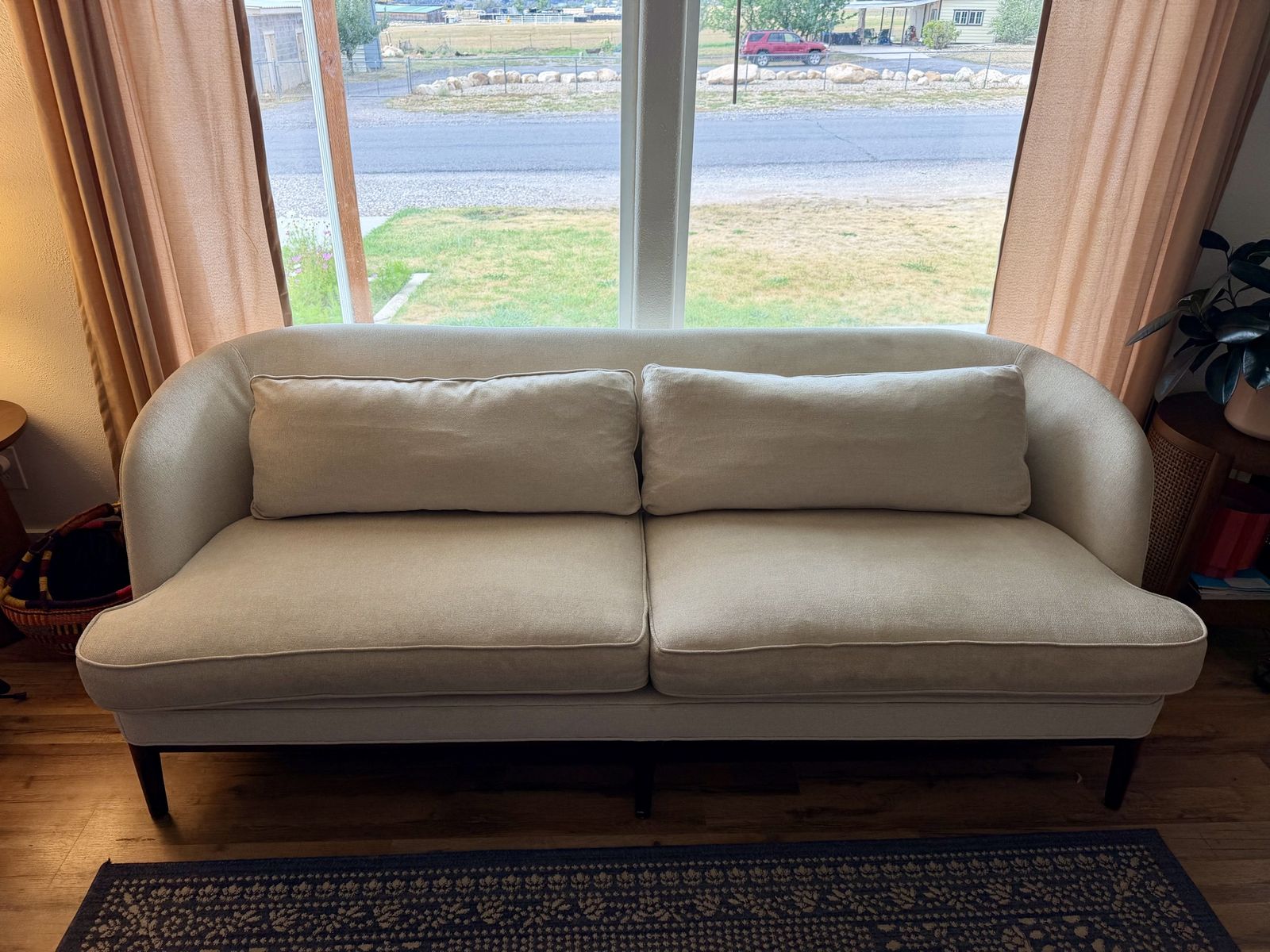 Modern Cream Fabric Sofa with Curved Back and Wood Legs