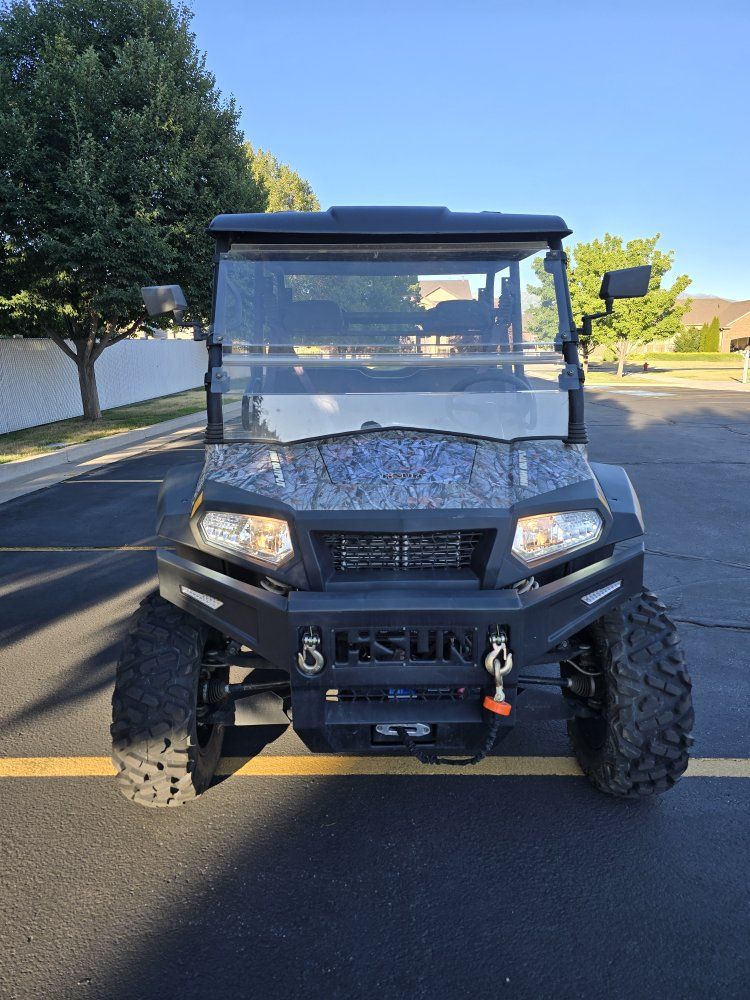 Hisun Sector 1000 Crew Camo UTV - ONLY 25 HOURS, has wench and hydraulic bed lift. 16ft trailer also for sale separately.