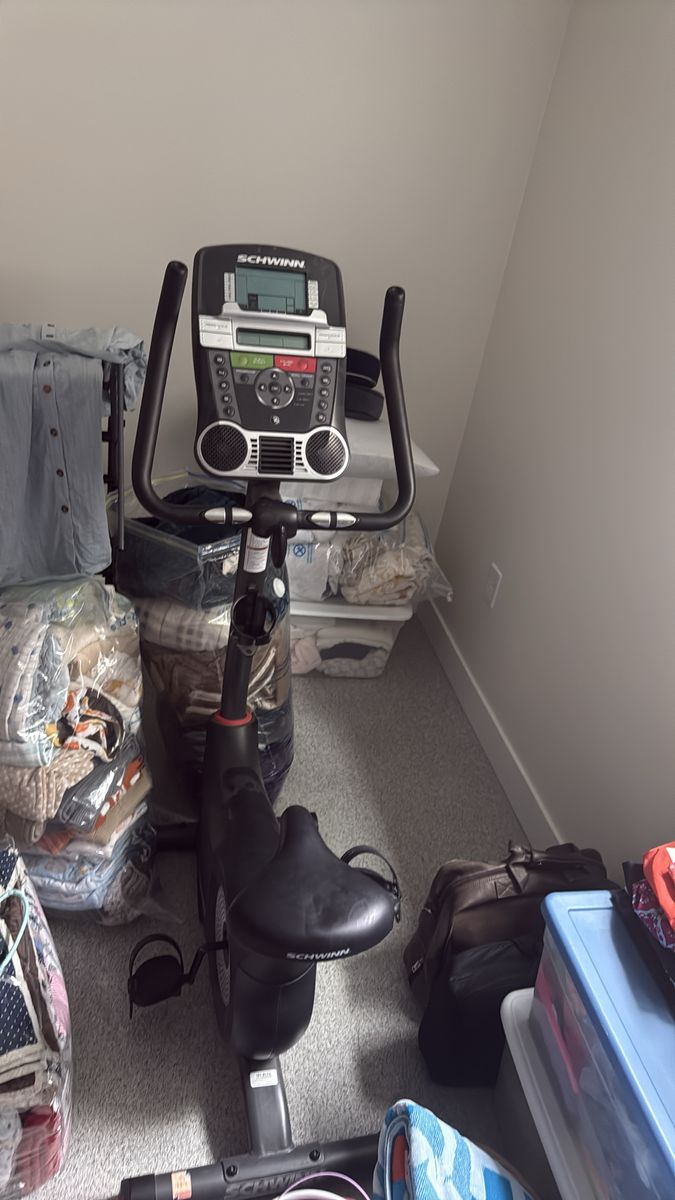 Schwinn Upright Exercise Bike with Digital Display and Built-in Speakers