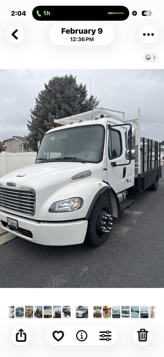 White Freightliner M2-106 Flatbed Truck