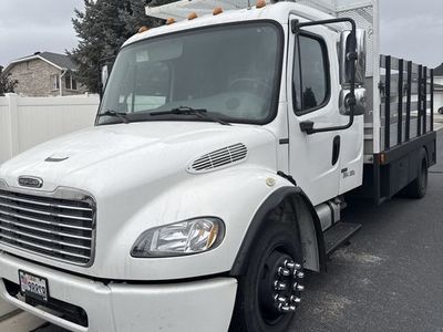 White Freightliner M2-106 Flatbed Truck