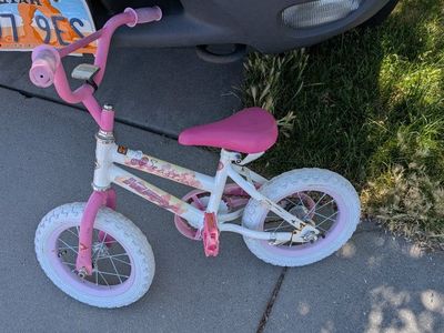 Pink and White Kids' Bicycle - Good Condition, Ready for Fun Rides