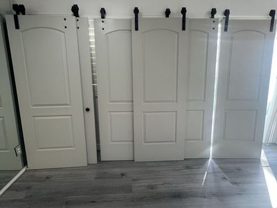 7 Wood Sliding Barn Doors with Black Hardware - Arched Panel Design - 2 rails