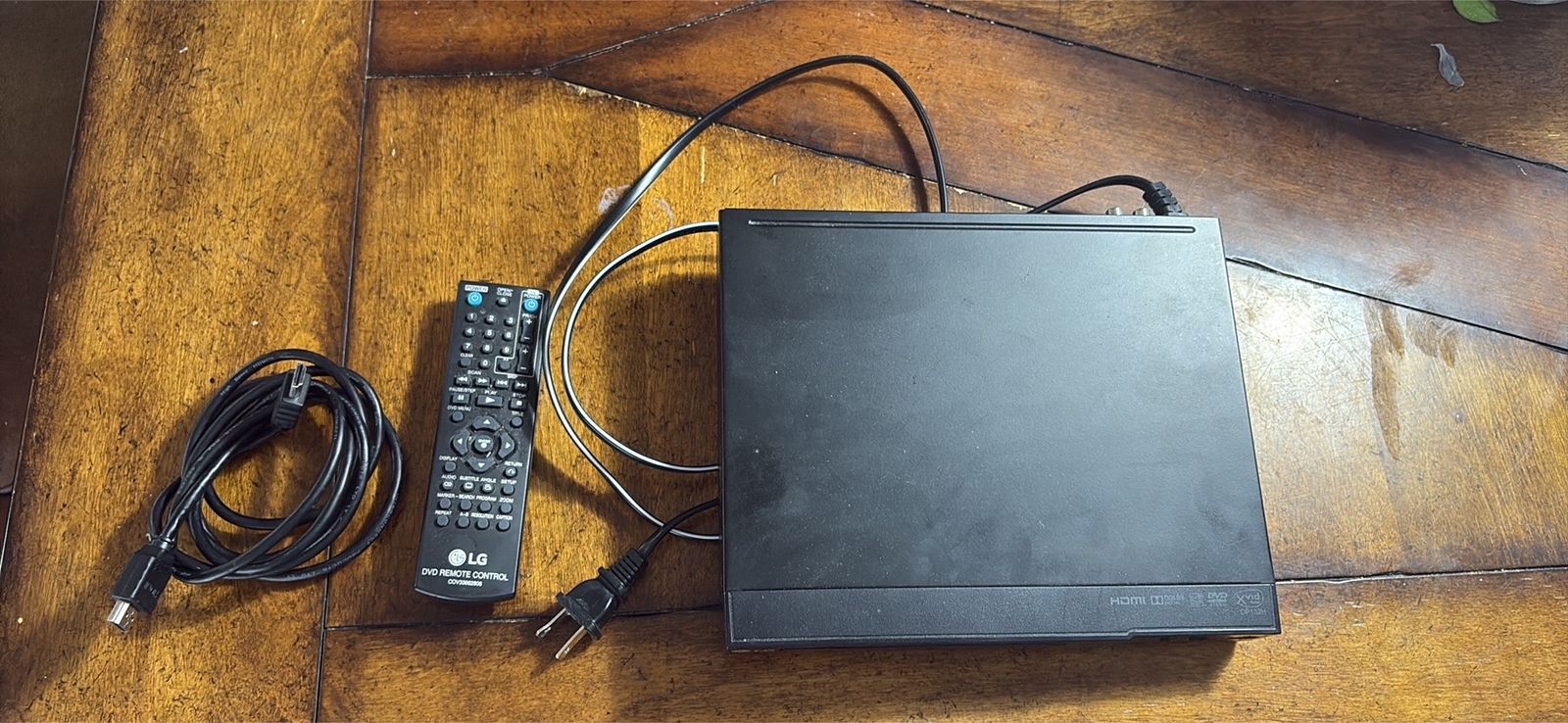 LG DVD/CD Player with Remote and HDMI Cable – $20