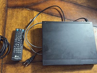 LG DVD/CD Player with Remote and HDMI Cable – $20