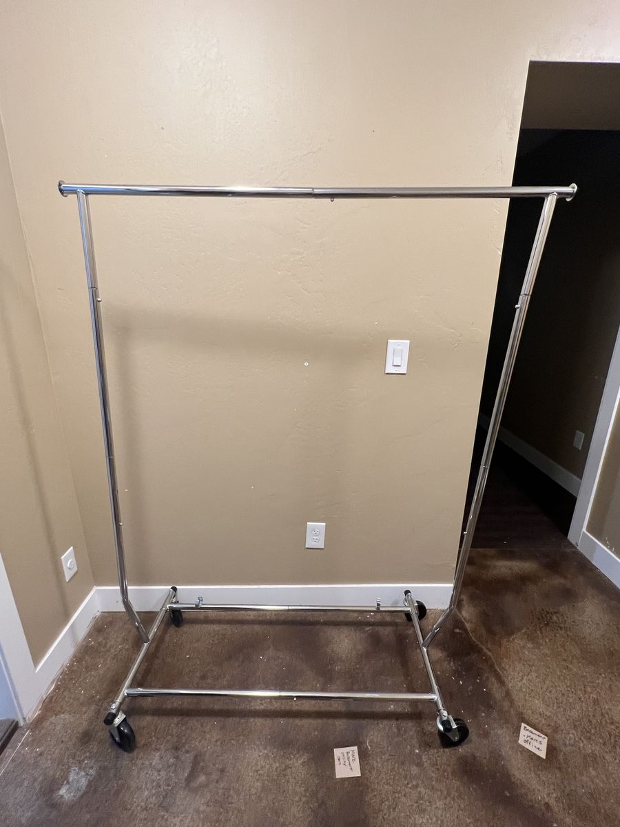 Adjustable chrome clothing rack