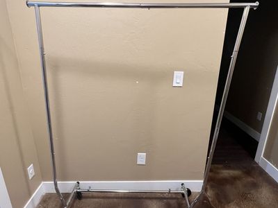 Adjustable chrome clothing rack